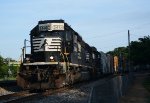 NS yard job E23 crosses Washington Street in downtown Lynchburg with cars for CSX interchange in tow.